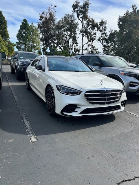 White Mercedes-Benz gleaming after a full detail